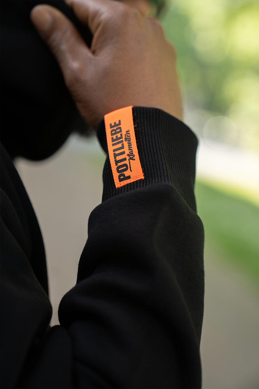 Hoodie "GKÜCK AUF" Schwarz / Orange