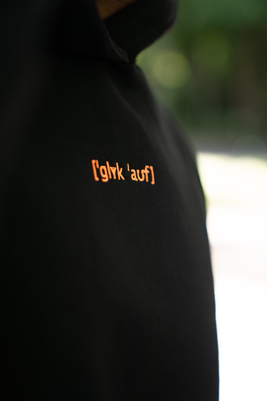 Hoodie "GKÜCK AUF" Schwarz / Orange