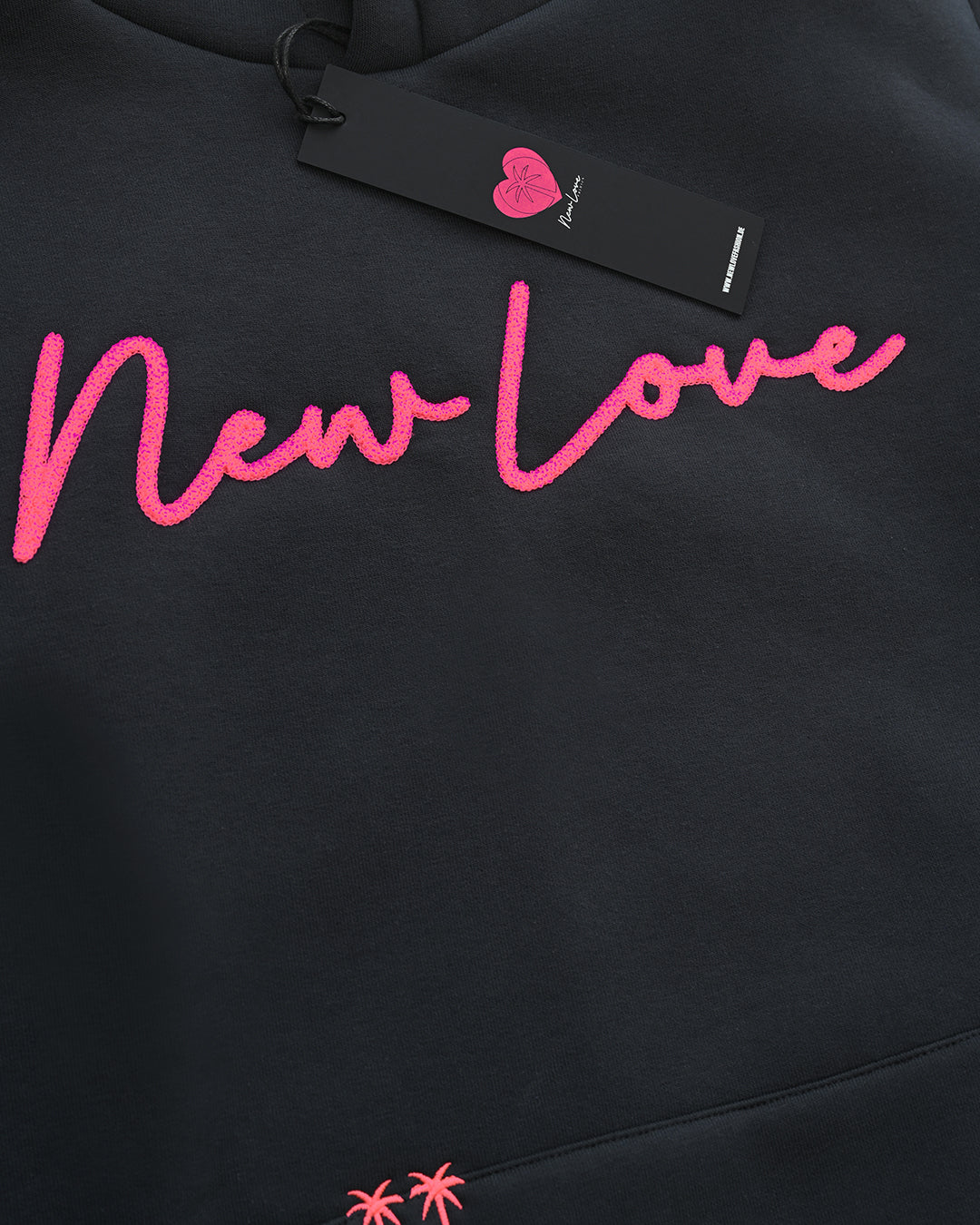 Sudadera con capucha negra lavada rosa!